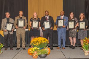 Seven former student athletes became members of the Athletics Hall of Fame on Sept. 30.  The class of 2016 included, from left, George Hayward ’75 (Meritorious Service), Eric McDowell ’04 (football 2000-03), Jill (Johnson) Brock ’08 (women’s basketball 2004-08), Michael Cobbins ’07 (football 2003-06),), Eric Keeler (men’s basketball 1995-97), Lindsey (Predovich) Christenson ’07 (softball 2004-07) and Sherri (Lang) Pendergras ’02 (volleyball 1997-98).  