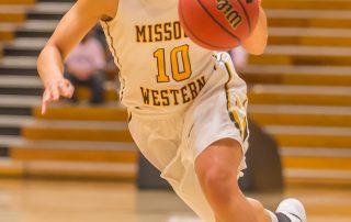 Gaurd Melia Richardson charges in for a shot. Richardson now a junior, has beein playing for Western since freshman year